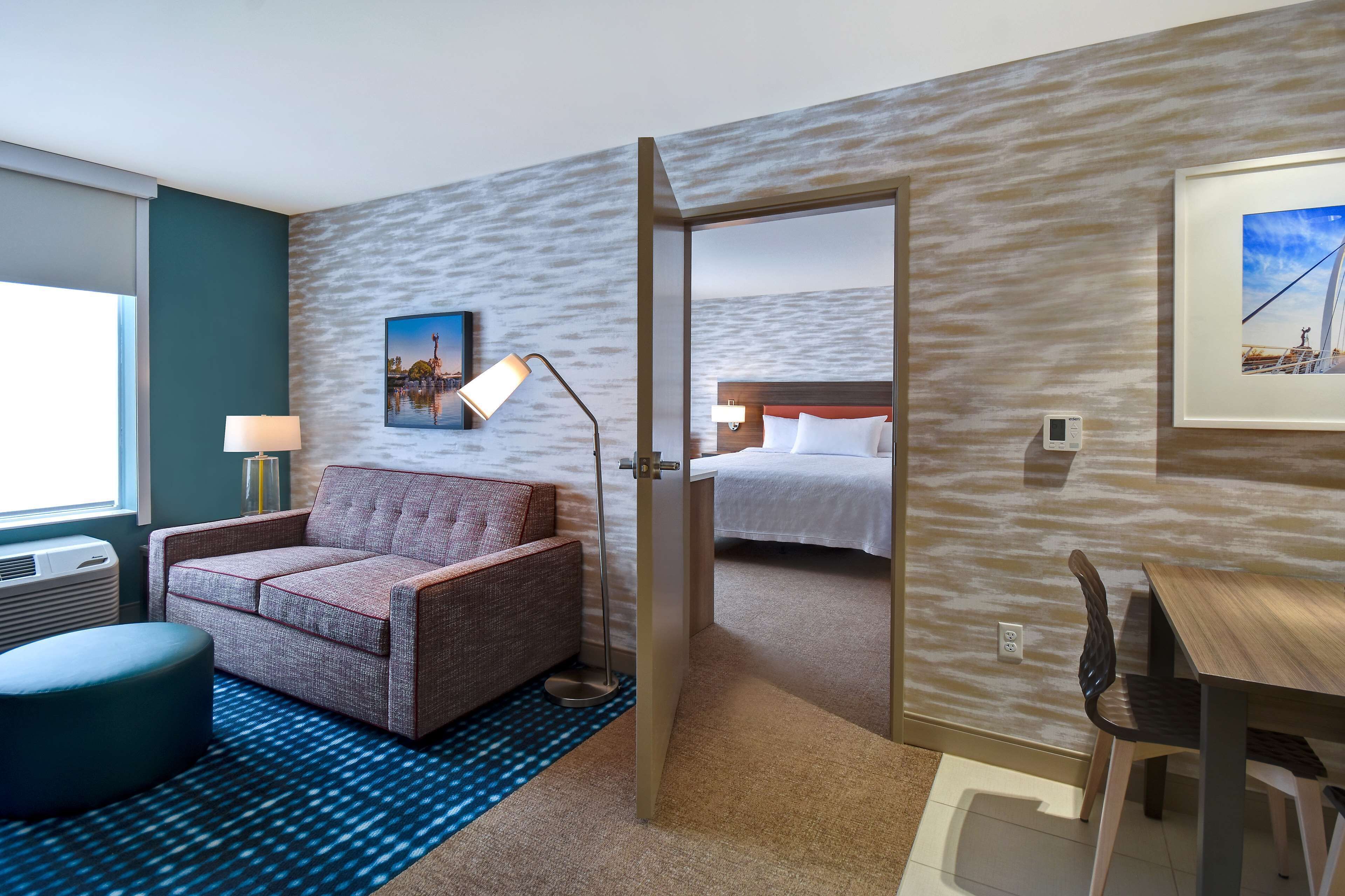 suite, 1 king bed, accessible (mobility & hearing, roll-in shower) | living area | 43-inch led tv with satellite channels, tv, netflix