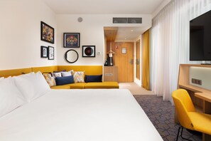 Room, 1 King Bed, City View | Minibar, in-room safe, soundproofing, iron/ironing board