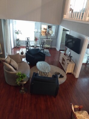 Smart TV, fireplace, books, offices