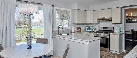 Microwave, dishwasher, coffee/tea maker, cookware/dishes/utensils
