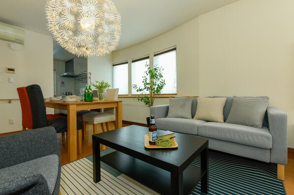 Apartment, 1 Bedroom | Living area | Flat-screen TV