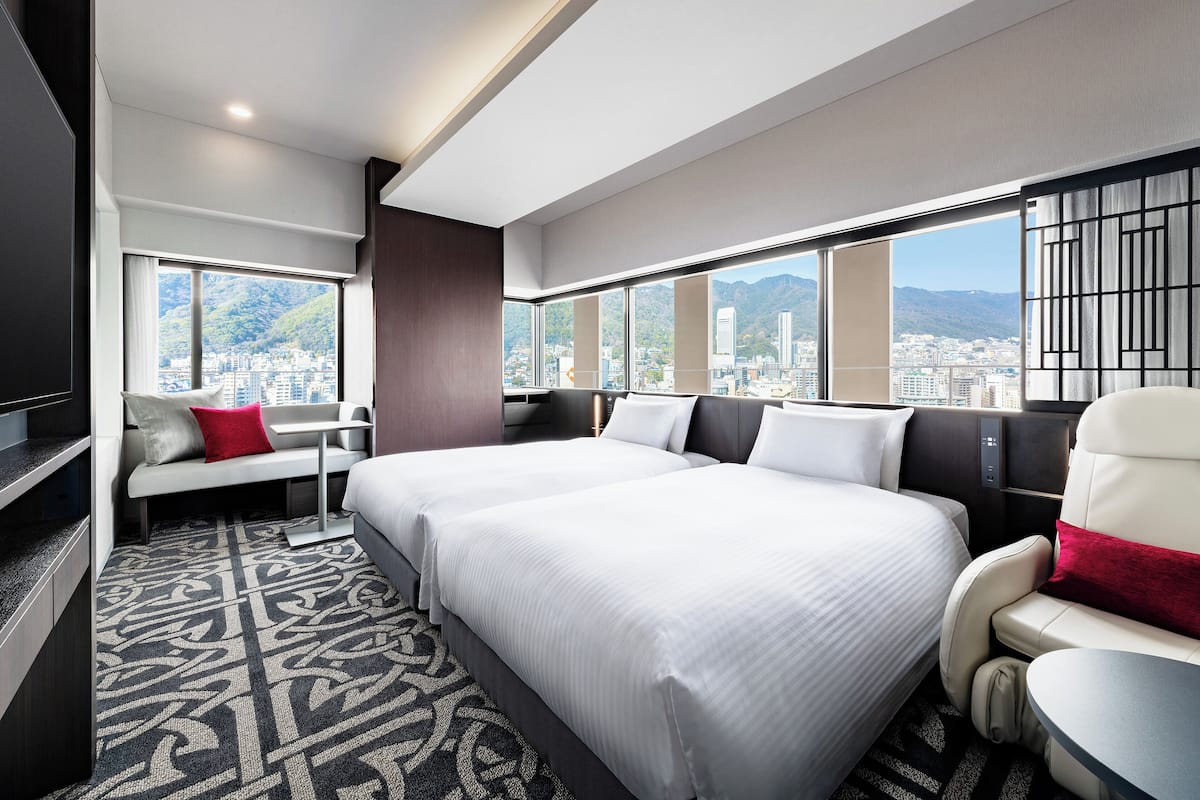 Een kluis op de kamer, verduisterende gordijnen, gratis wifi, beddengoed