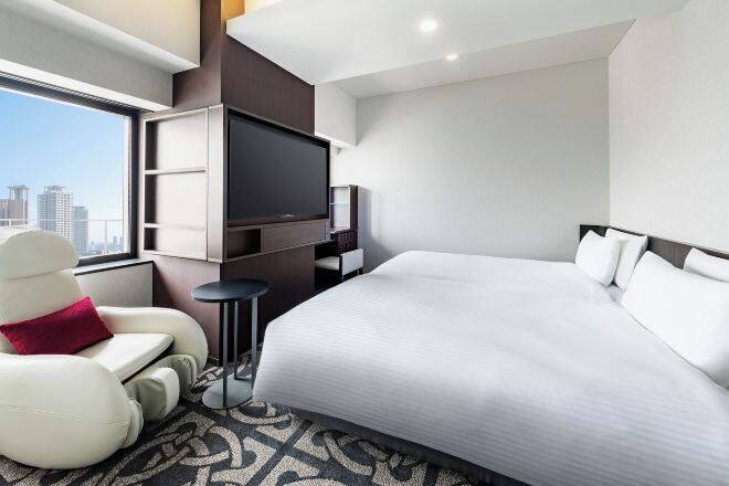 خزنة داخل الغرفة وستائر تعتيم وواي فاي مجانًا وملاءات أسرّة