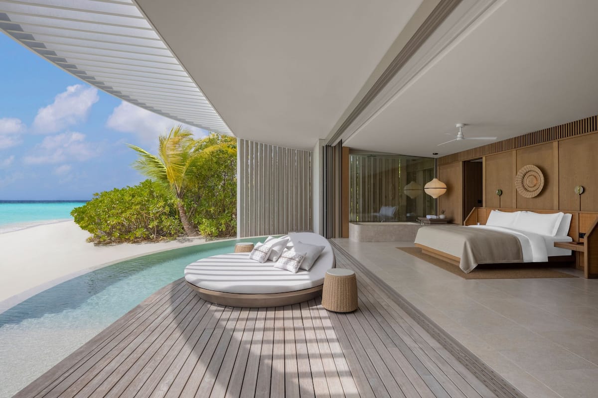 Outdoor pool, open 7:00 AM to 7:00 PM, free cabanas, pool umbrellas