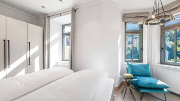 Premium bedding, down duvets, in-room safe, blackout curtains