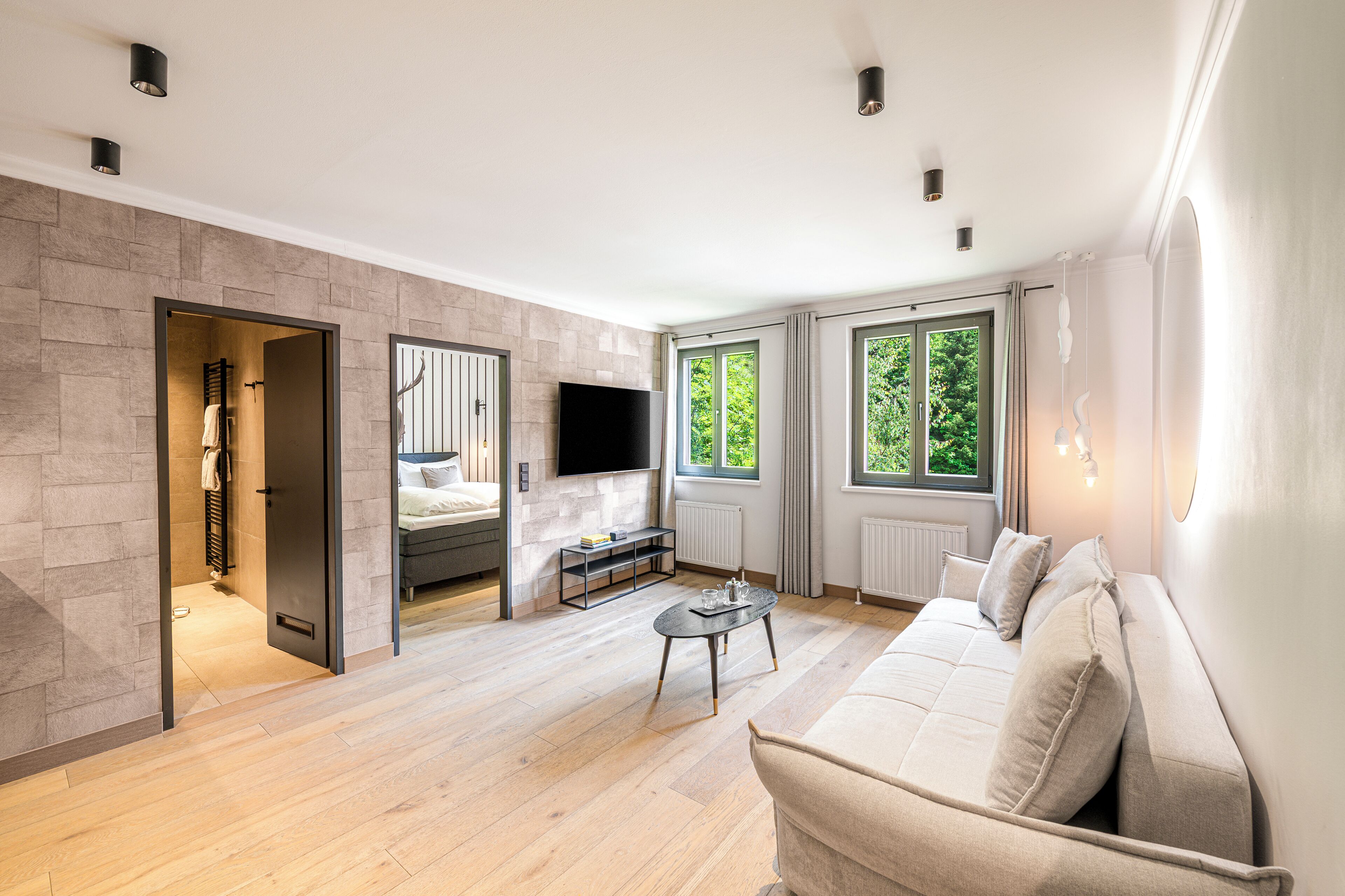 Apartamento luxo, 1 quarto | Área de estar | TV LED 55 polegadas com canais a cabo, TV, Netflix