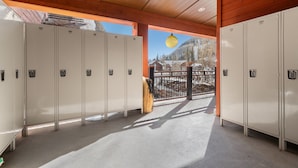 A row of lockers with a view of a mountain and buildings in the background. - Value Condo, Hot Tub and Pool, Walk to Trails! (Durango)