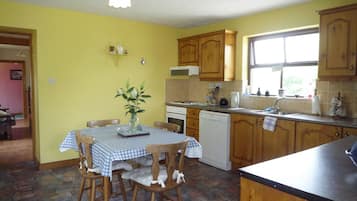 Cottage, 2 Bedrooms, Kitchen | Private kitchen | Microwave, highchair