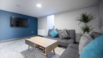 House | Living room | 30-inch TV with digital channels