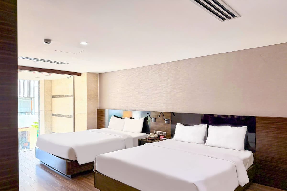 Premier Family Room with City view | Minibar, in-room safe, individually decorated, individually furnished