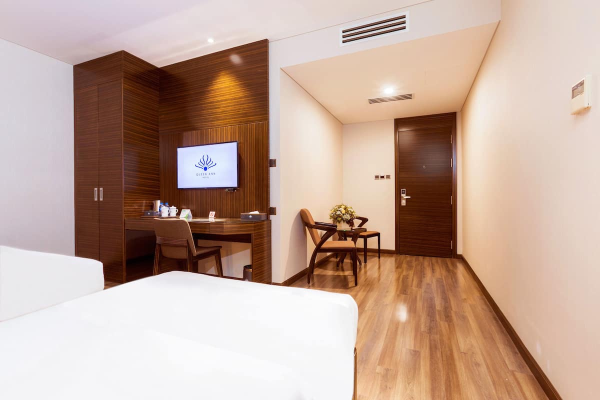 Premier Triple Room | Minibar, in-room safe, individually decorated, individually furnished