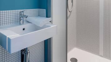 Shower, eco-friendly toiletries, hair dryer (on request), towels