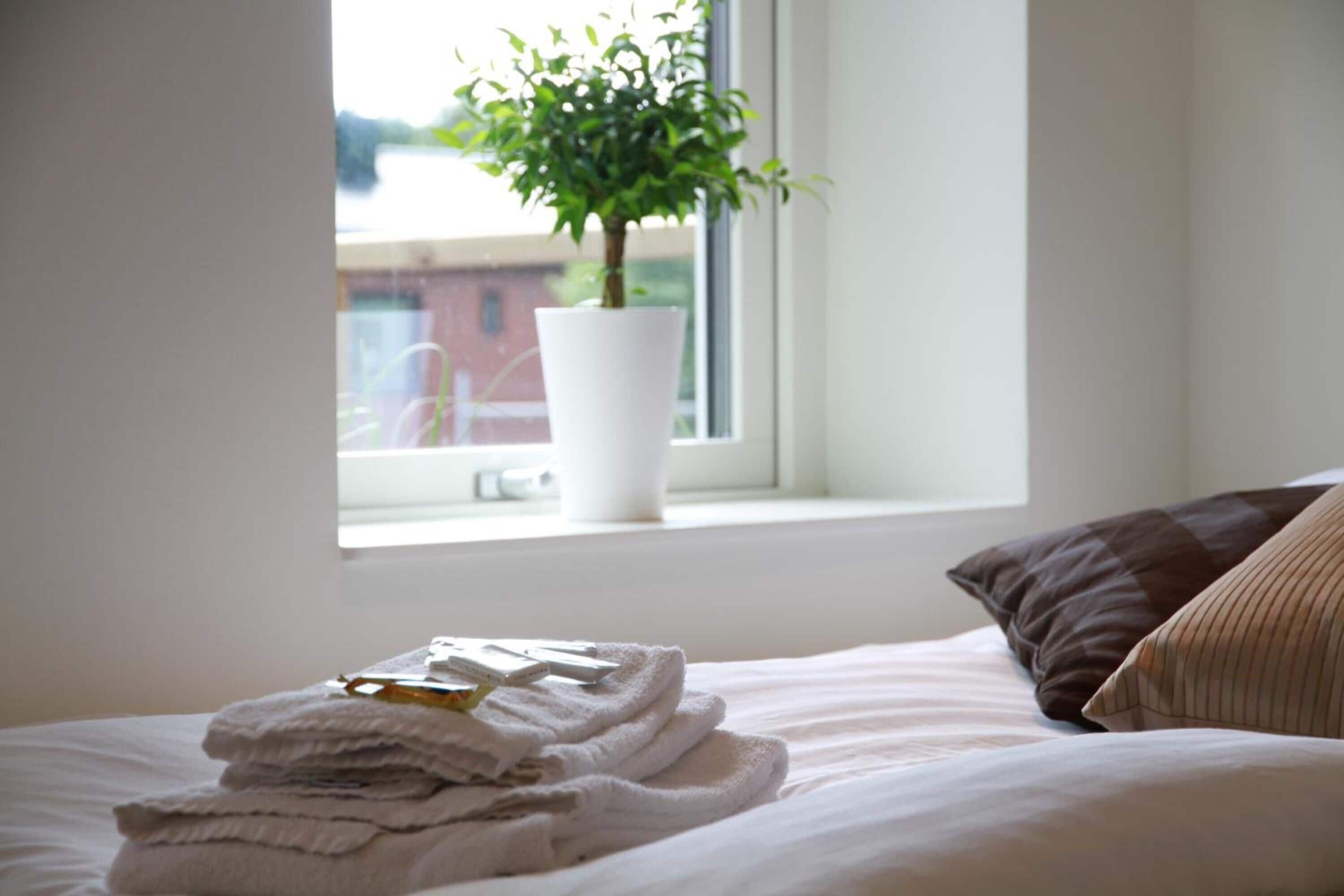 Ropa de cama de alta calidad y colchones con acolchado adicional