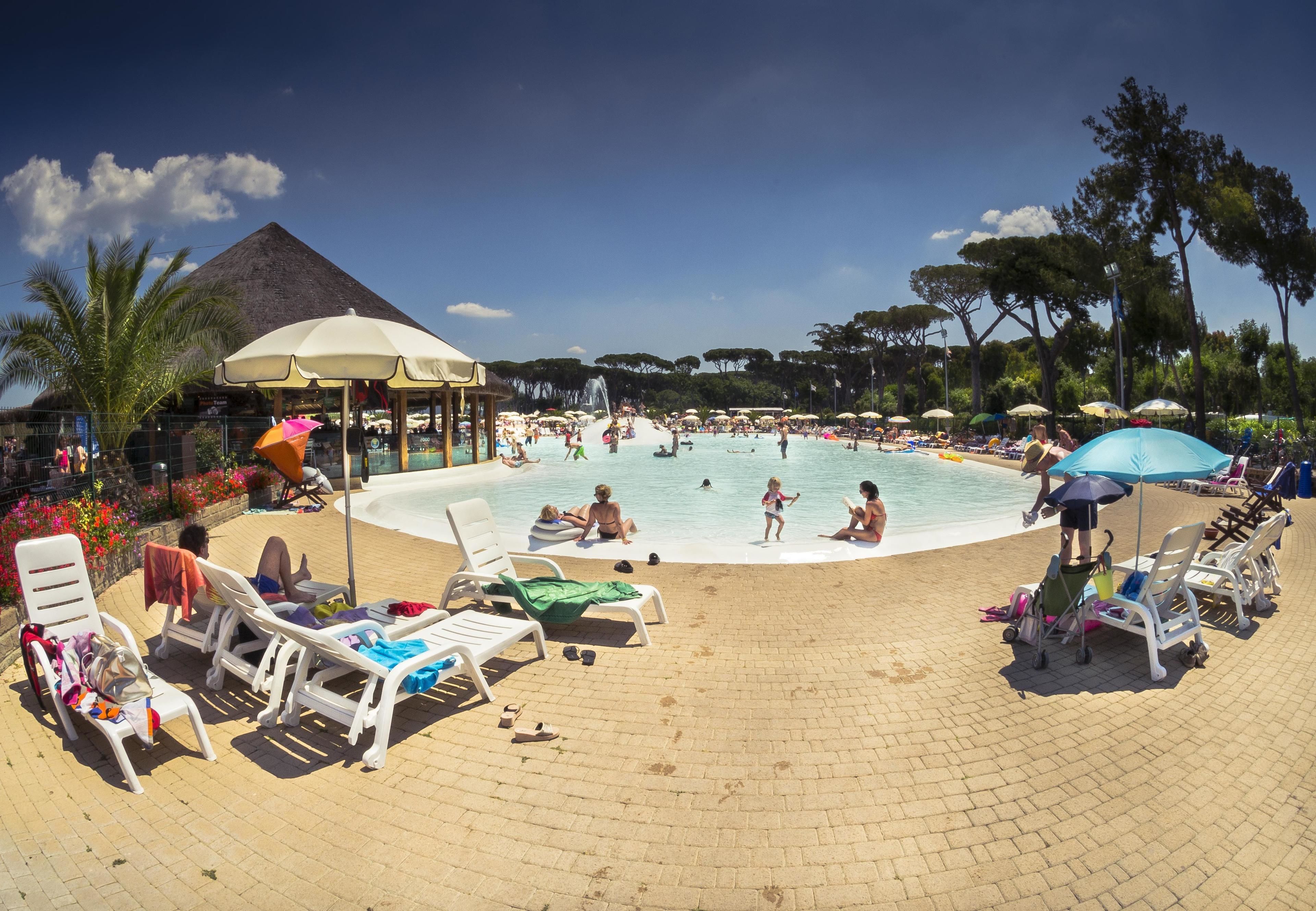 6 outdoor pools, open 9 am to 7 pm, pool umbrellas, pool loungers