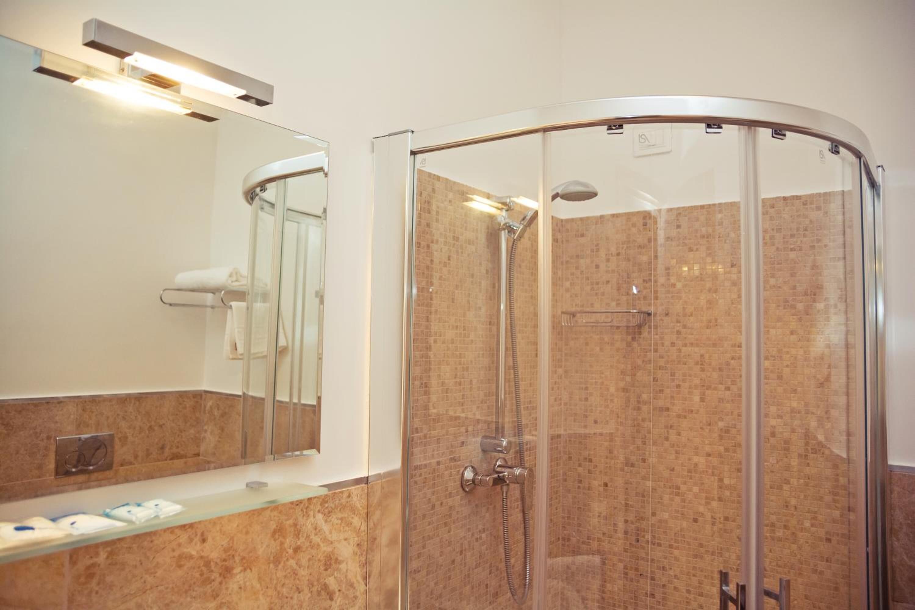 designer toiletries, hair dryer, dressing gowns, bidet