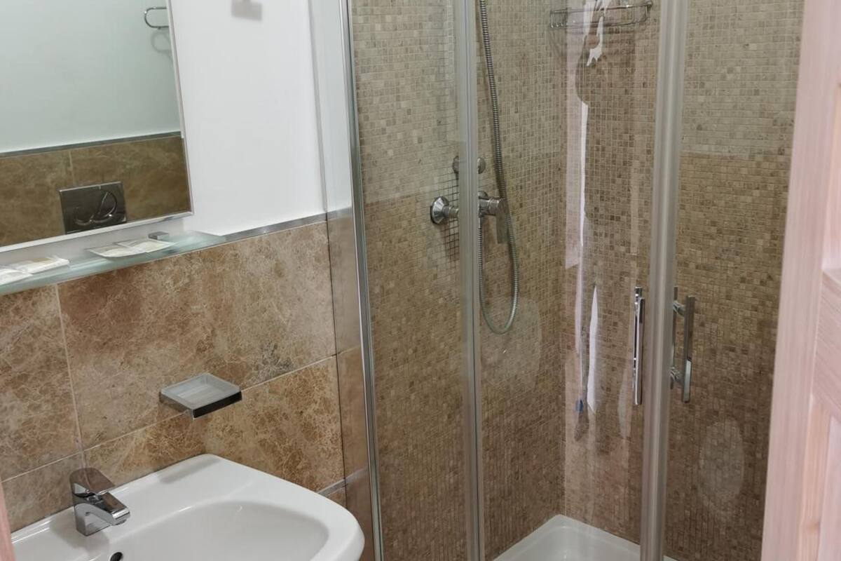 designer toiletries, hair dryer, dressing gowns, bidet