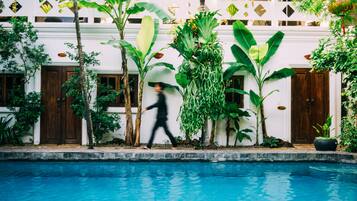 2 outdoor pools, pool umbrellas, pool loungers