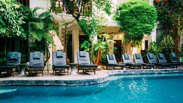 2 outdoor pools, pool umbrellas, pool loungers