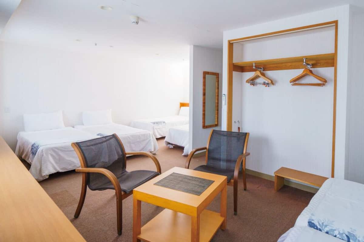 Premium bedding, blackout drapes, WiFi (free), bed sheets