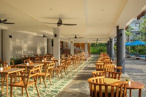 Breakfast, lunch, dinner served; Indonesian cuisine, pool views