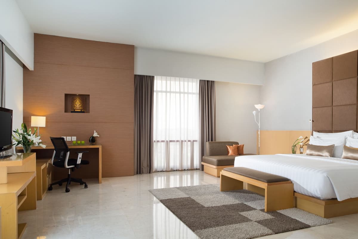 santika suite | premium bedding, in-room safe, desk, rollaway beds