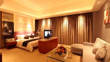 Premium bedding, down duvets, pillow-top beds, in-room safe