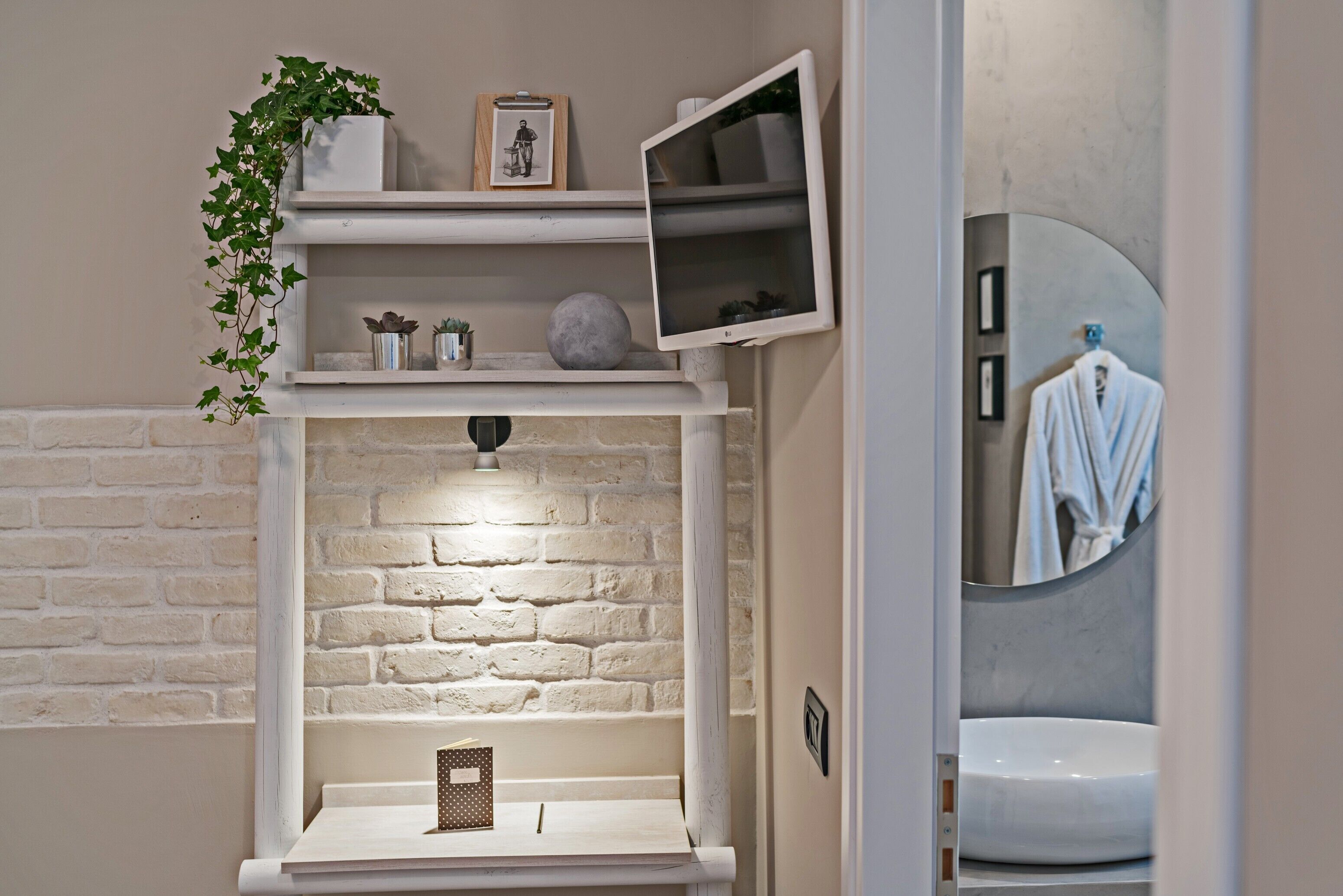 deluxe studio, garden view | in-room safe, desk, blackout curtains, iron/ironing board