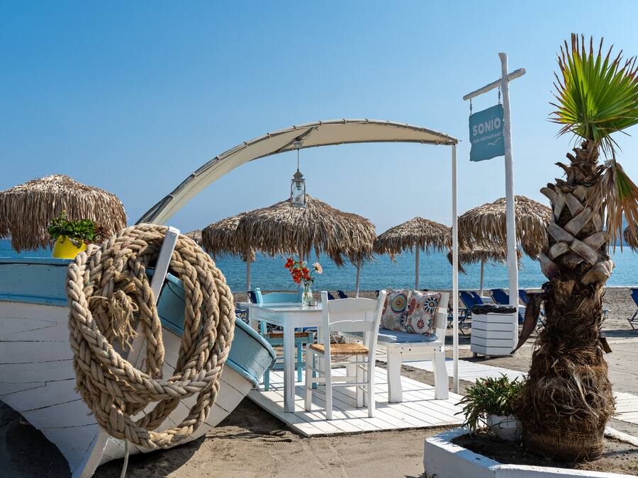 On the beach, sun-loungers, beach umbrellas, beach towels