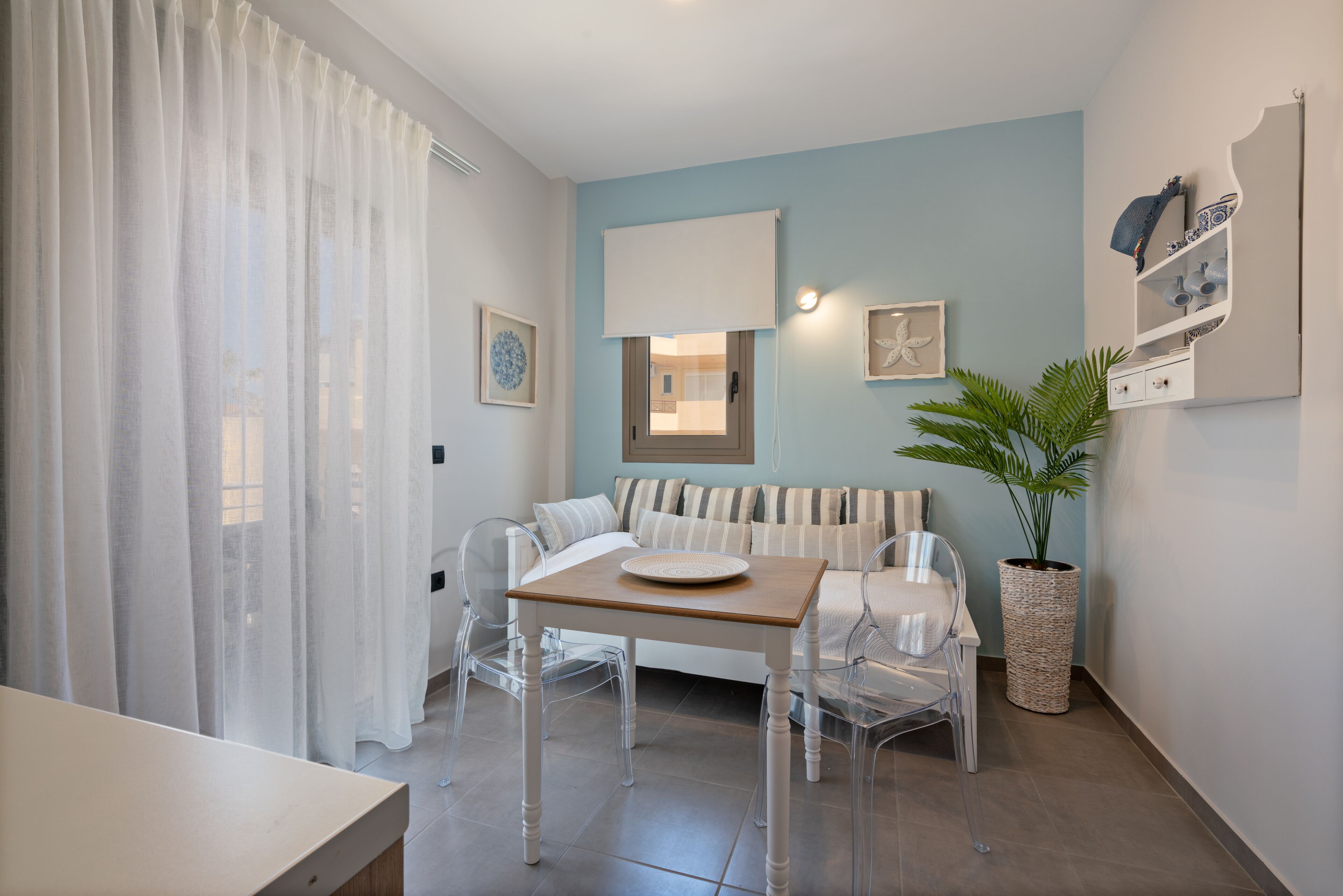 deluxe apartment, 1 bedroom, partial sea view, sea facing | in-room safe, desk, blackout curtains, iron/ironing board