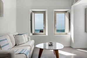 Honeymoon Suite (with Plunge Pool) | Living area | 40-inch plasma TV with satellite channels, TV, iPad - Grace Hotel, Auberge Collection (Santorini)