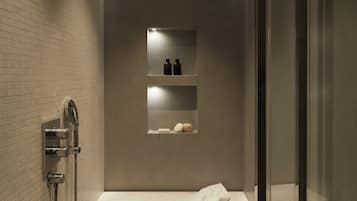 Shower, designer toiletries, hair dryer, bathrobes