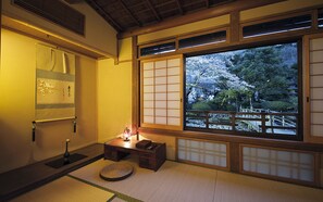 Superior Quadruple Room, Multiple Beds, Shared Bathroom | Living area | LCD TV