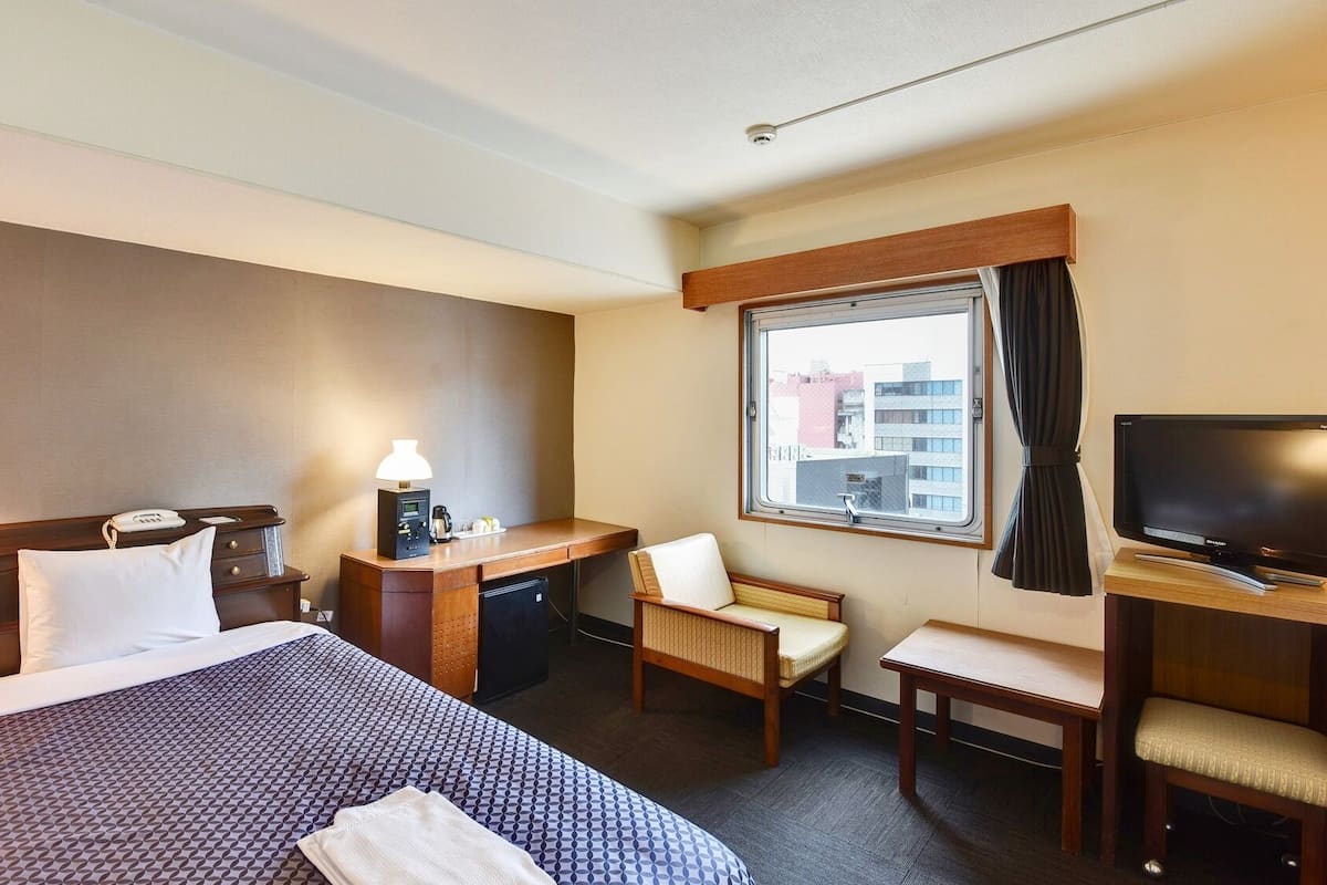 Desk, blackout drapes, iron/ironing board (on request), WiFi (free)