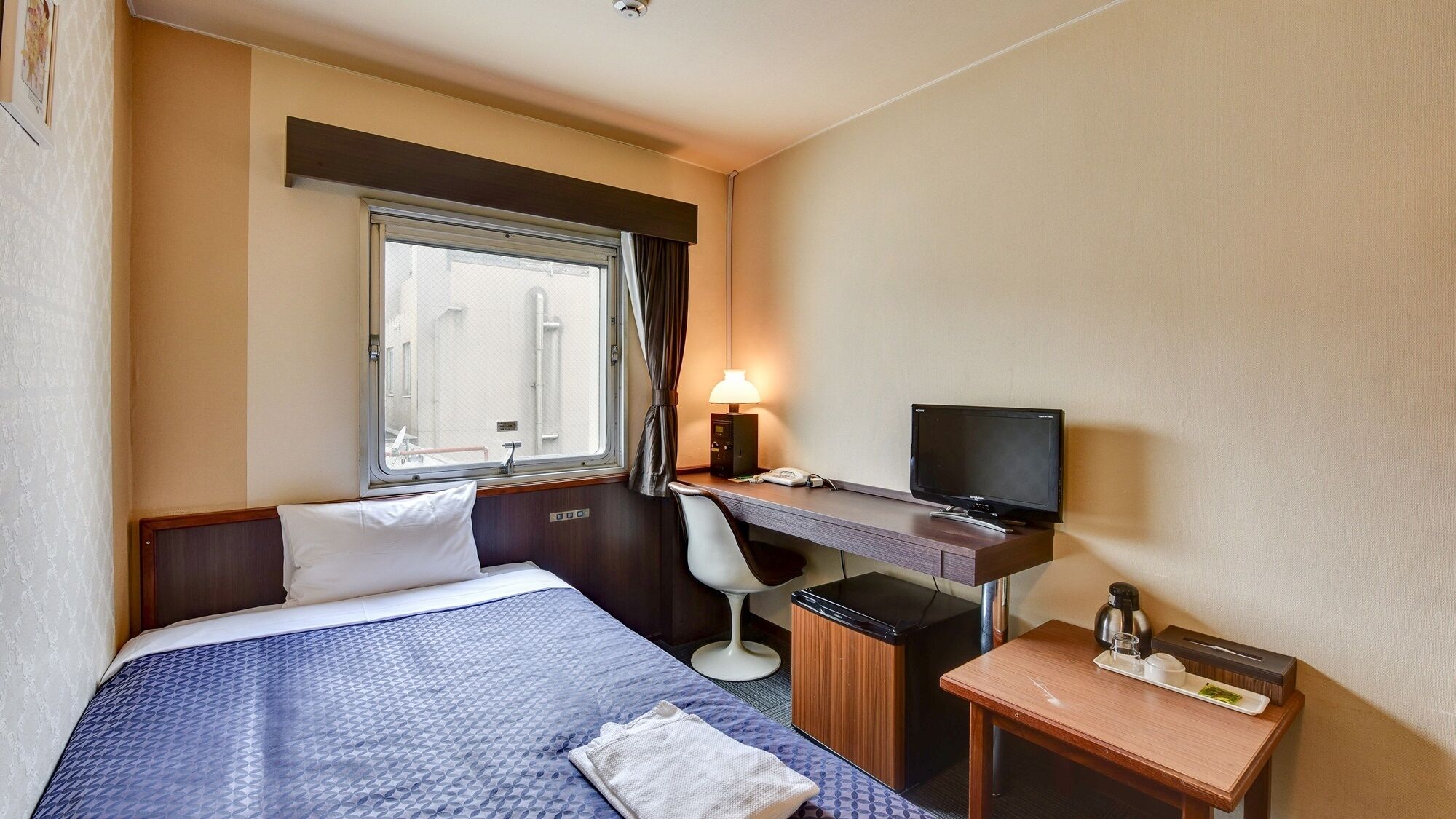 Desk, blackout drapes, iron/ironing board (on request), WiFi (free)