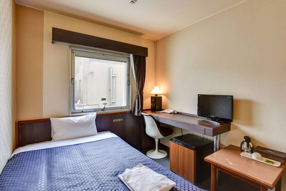 Desk, blackout curtains, iron/ironing board (on request), free WiFi