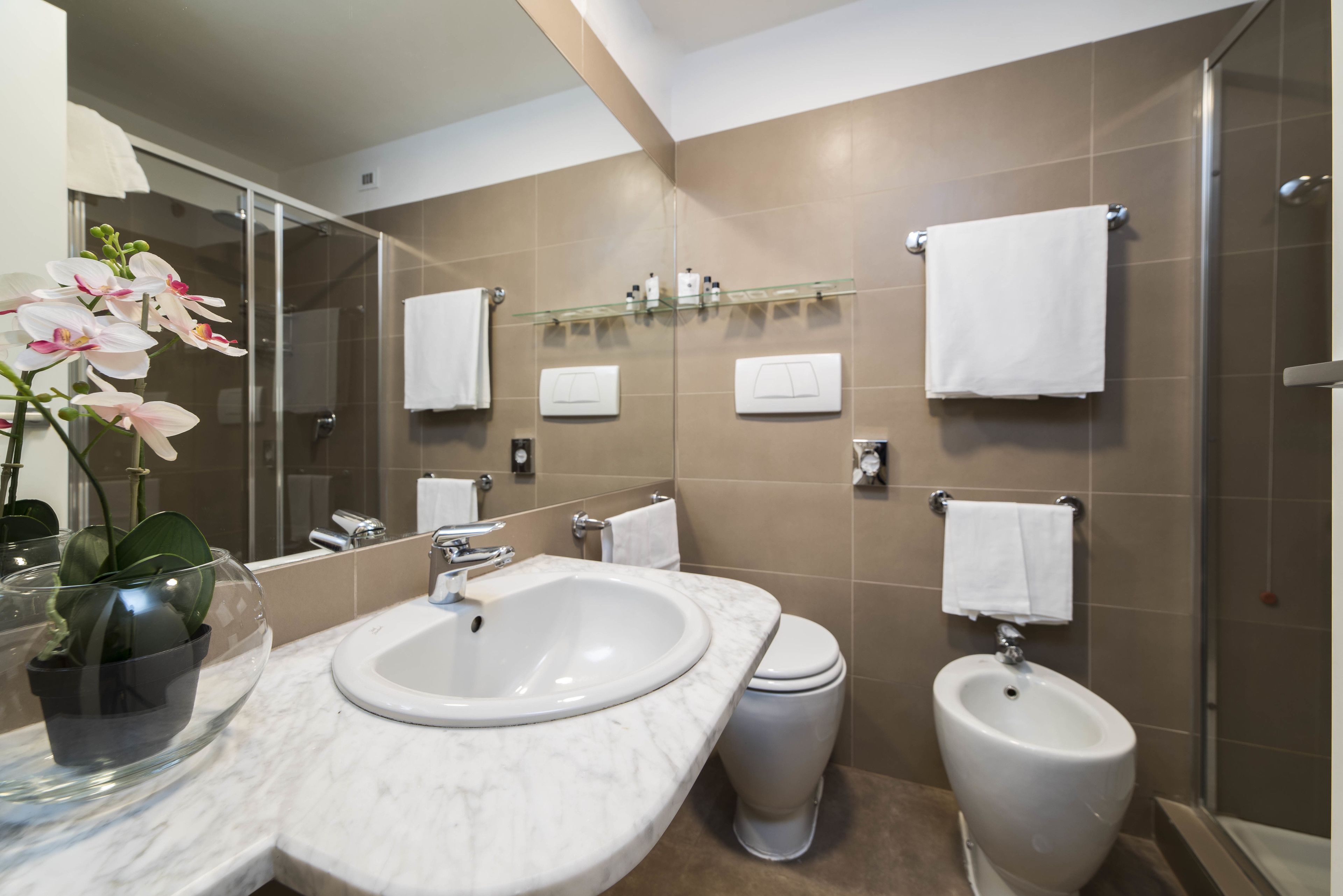 superior triple room | bathroom | free toiletries, bidet, towels