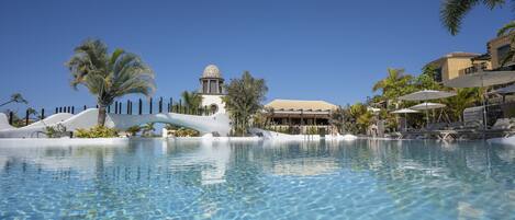 2 outdoor pools, open 10:00 AM to 6:00 PM, pool umbrellas, pool loungers