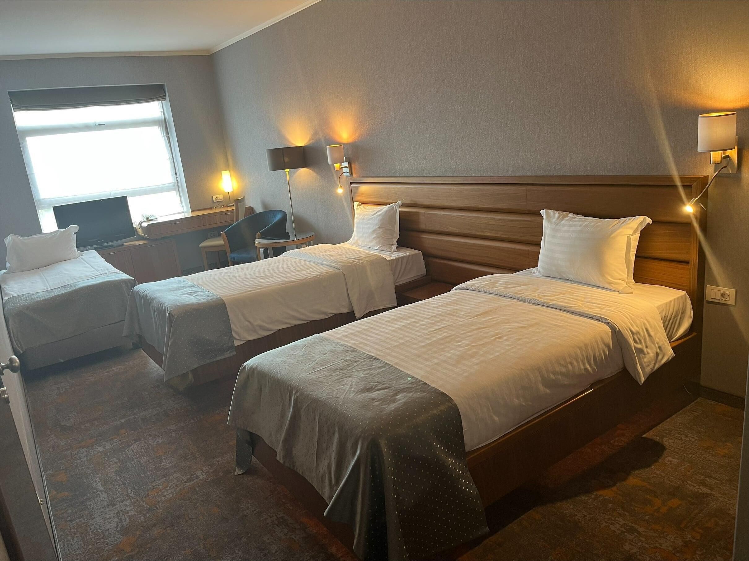 Deluxe Room, 2 Twin Beds, Mobility Accessible | Minibar, in-room safe, desk, blackout drapes