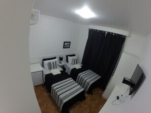Suite clásica | Caja de seguridad en la habitación y cortinas blackout 