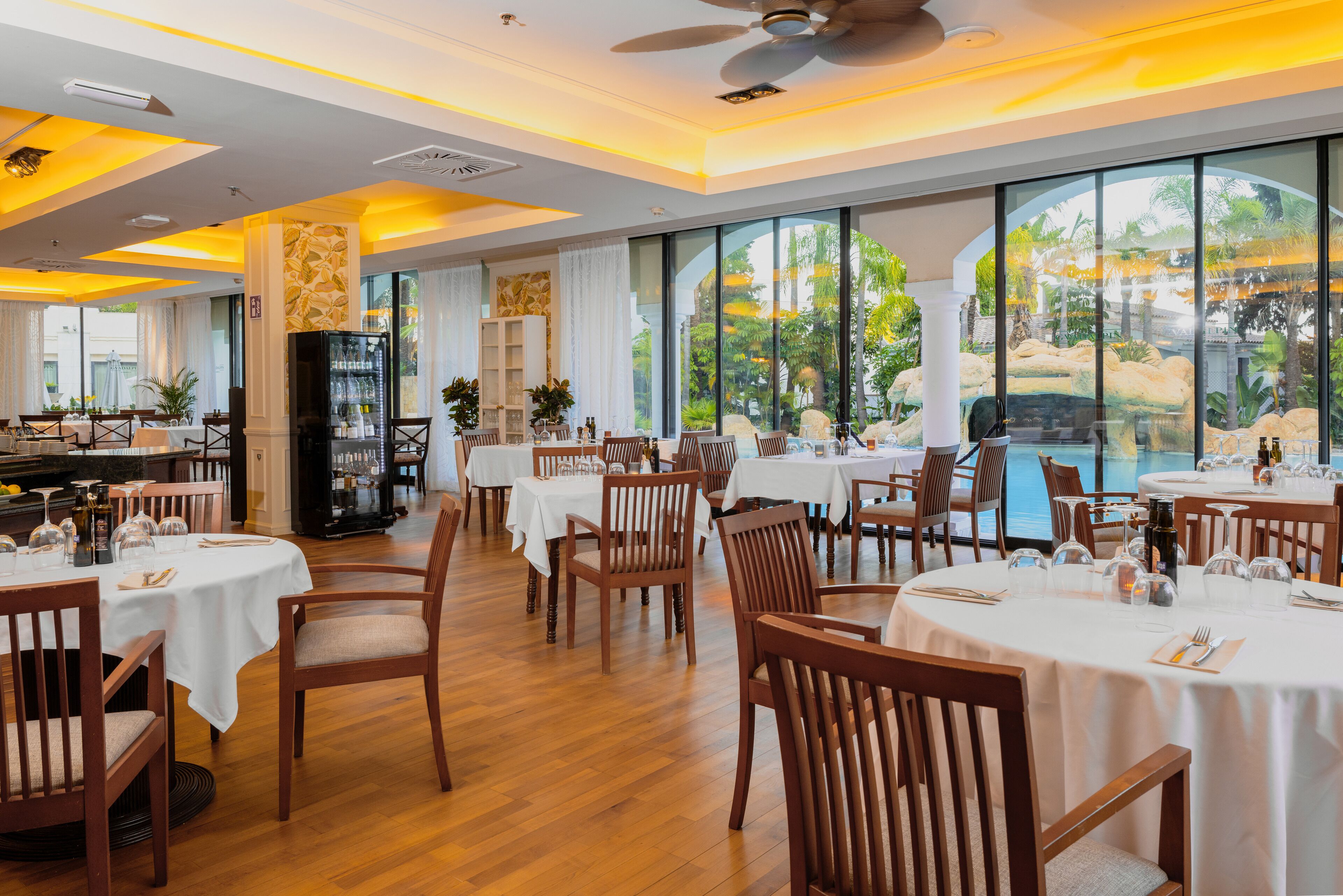 Breakfast, lunch, dinner served; Fusion cuisine, pool views 