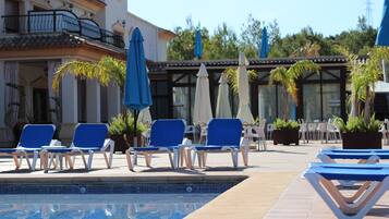 Outdoor pool, pool umbrellas, pool loungers
