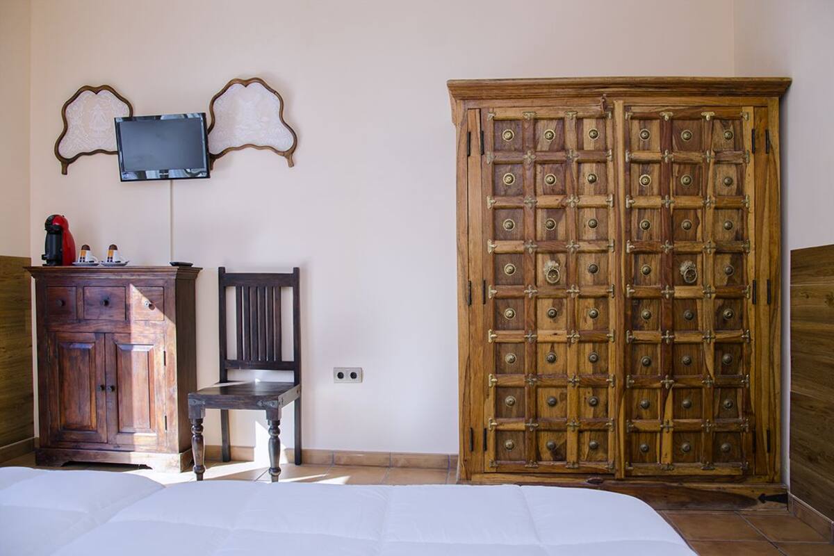 Quarto luxo, terraço, vista para a montanha | 1 quarto, cofres nos quartos, quartos à prova de som, Wi-Fi de cortesia