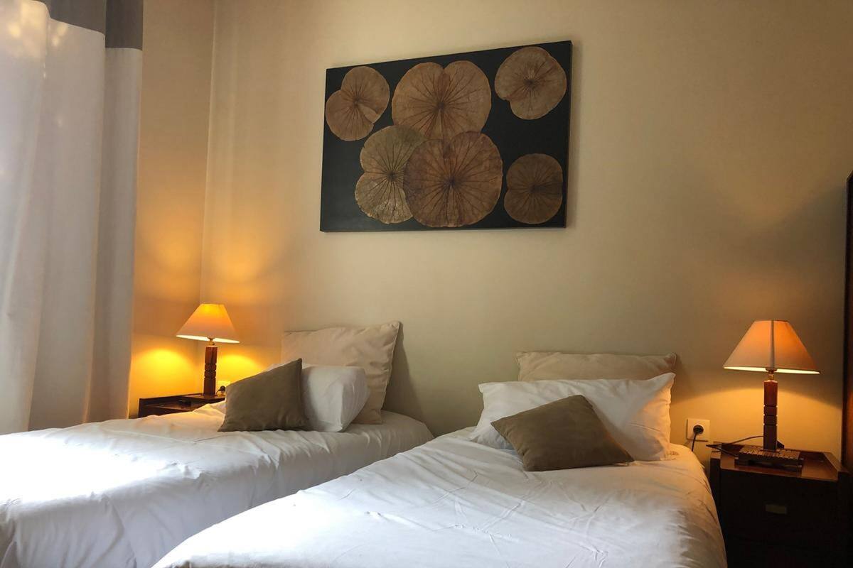 Select Comfort beds, desk, blackout curtains, soundproofing