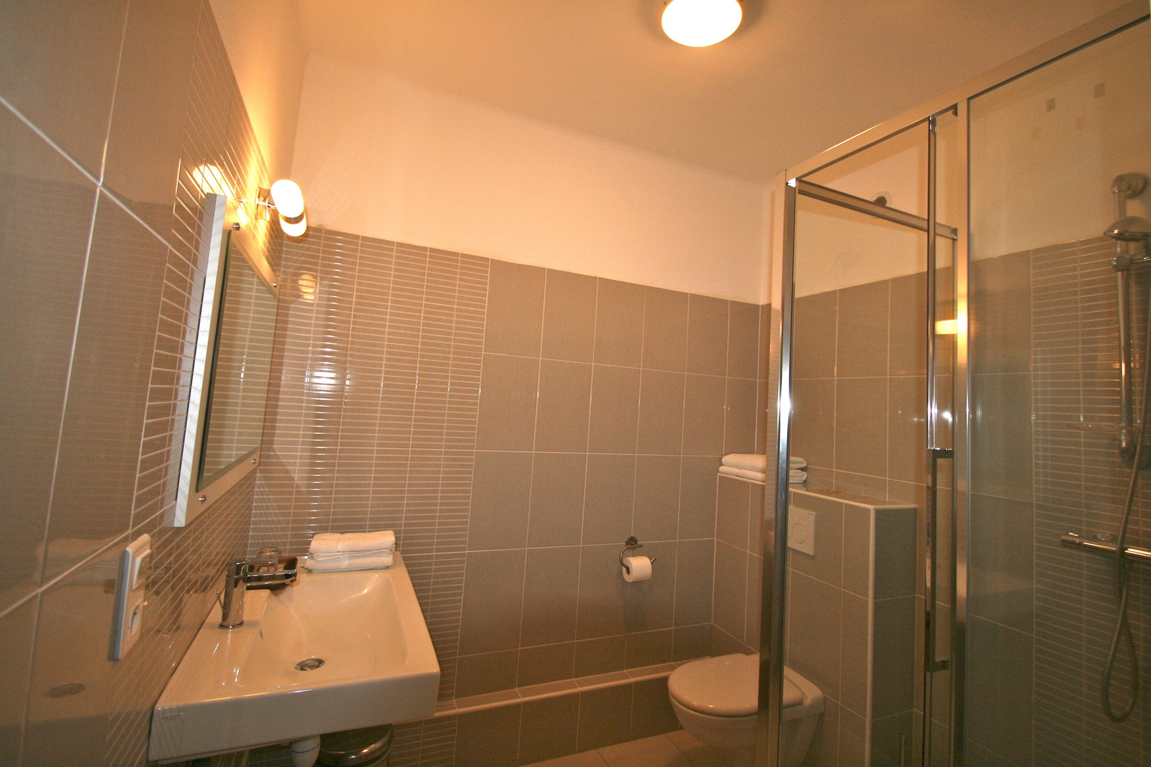 comfort twin room, 2 single beds, non smoking | bathroom | shower, hydromassage showerhead, eco-friendly toiletries, hair dryer