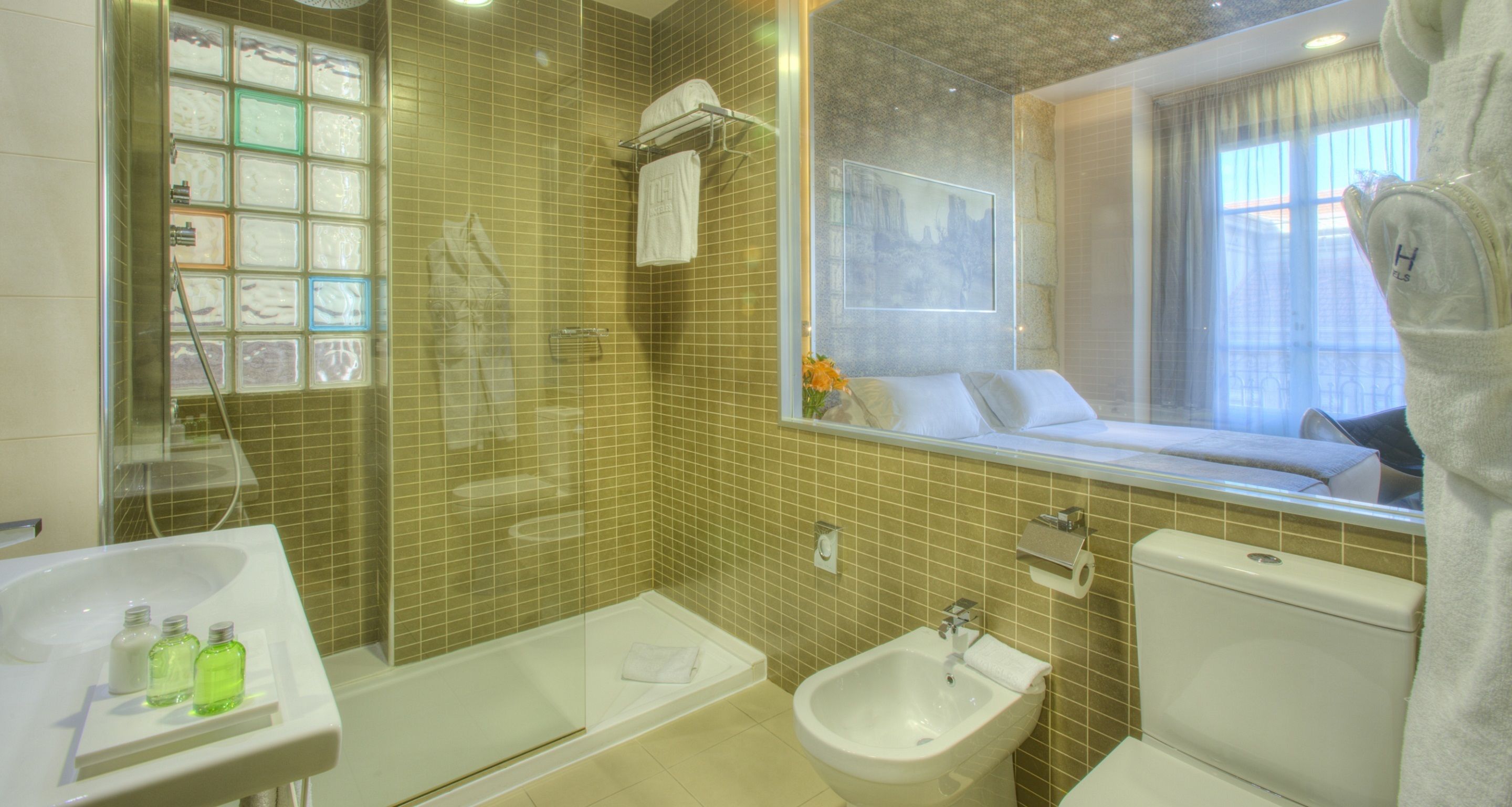 eco-friendly toiletries, hair dryer, bidet, towels