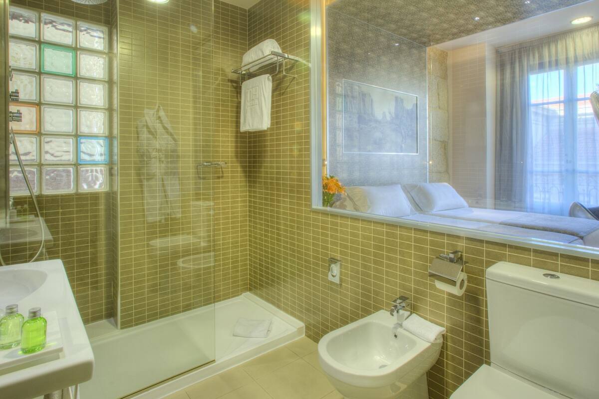 eco-friendly toiletries, hair dryer, bidet, towels