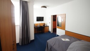 Chambre Simple Confort | Coin séjour