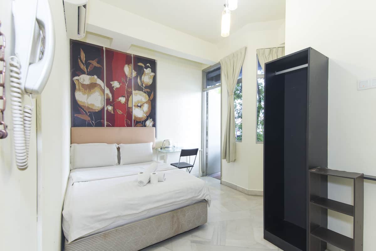 Habitación doble Deluxe | Tabla de planchar con plancha, wifi gratis y ropa de cama