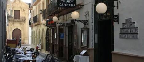 Breakfast, lunch, dinner served; local cuisine