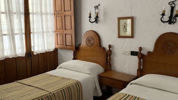 Double Room | Down comforters, desk, blackout drapes, iron/ironing board